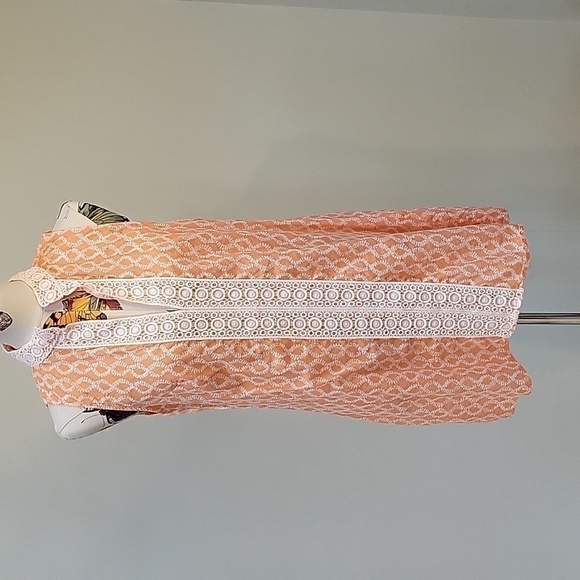 rock flower paper orange & white sleeveless tunic. Size is Large. 100% cotton. - Picture 2 of 8